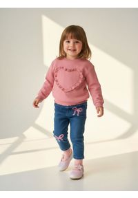 Sinsay - Jeansy pull on z ozdobnymi cekinami - niebieski. Kolor: niebieski. Materiał: jeans #1