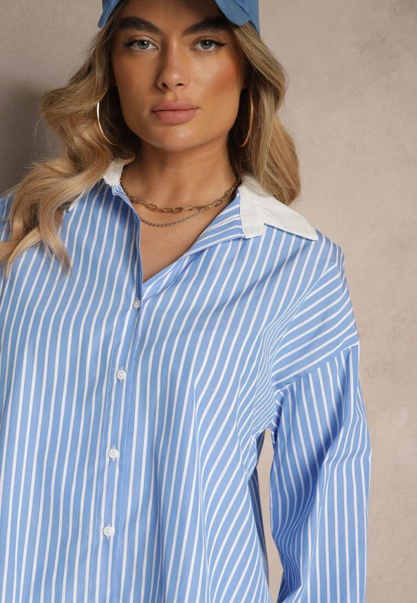 Renee - Niebieska Prążkowana Koszula o Fasonie Oversize z Kontrastowymi Wstawkami Onelira. Okazja: do pracy, na spotkanie biznesowe, na co dzień. Typ kołnierza: kołnierzyk klasyczny. Kolor: niebieski. Materiał: prążkowany. Długość rękawa: długi rękaw. Długość: długie. Styl: klasyczny, casual, elegancki, biznesowy