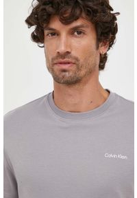 Calvin Klein t-shirt bawełniany kolor szary z nadrukiem. Kolor: szary. Materiał: bawełna. Wzór: nadruk #4