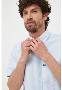 Lacoste koszula bawełniana męska kolor niebieski regular z kołnierzykiem button-down. Typ kołnierza: button down. Kolor: niebieski. Materiał: bawełna. Długość rękawa: krótki rękaw. Długość: krótkie #5