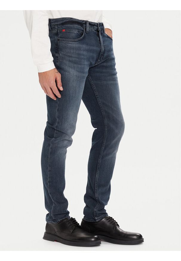 Hugo - HUGO Jeansy 50547247 Granatowy Extra Slim Fit. Kolor: niebieski