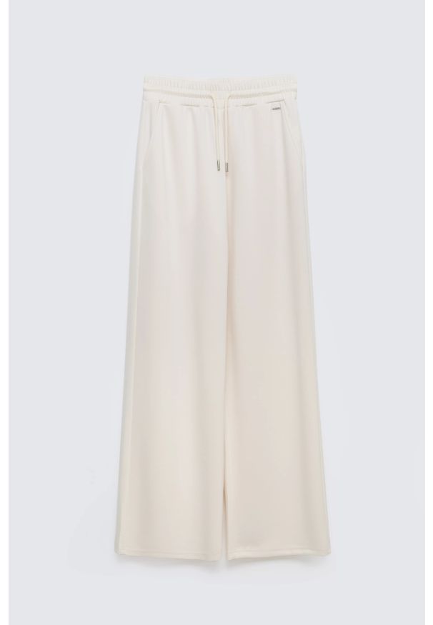 Big-Star - Spodnie damskie dresowe z szeroką nogawką kremowe Lunarap 102. Kolor: kremowy. Materiał: dresówka. Styl: elegancki