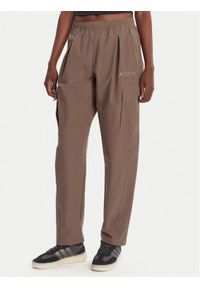 Adidas - adidas Spodnie outdoor Terrex Xploric JM9857 Brązowy Loose Fit. Kolor: brązowy. Materiał: syntetyk. Sport: outdoor #1
