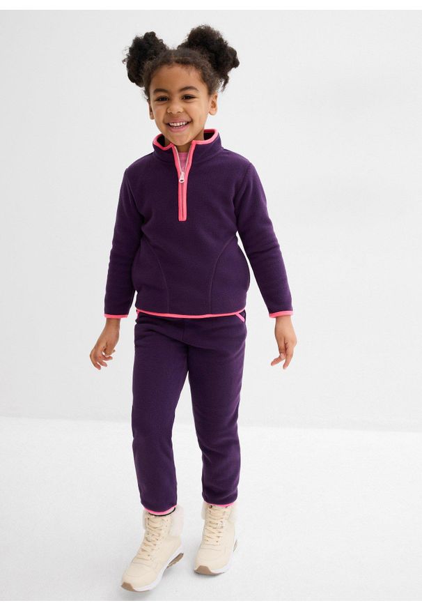 bonprix - Spodnie joggingowe z polaru. Kolor: fioletowy. Materiał: polar