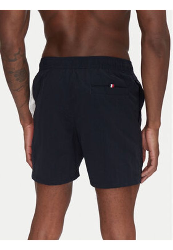 TOMMY HILFIGER - Tommy Hilfiger Szorty kąpielowe UM0UM03483 Granatowy Slim Fit. Kolor: niebieski. Materiał: syntetyk