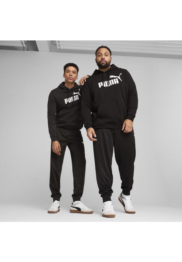 Puma - Męskie spodnie poliestrowe Essentials z logo No. 1 PUMA Black. Kolor: czarny. Materiał: poliester. Wzór: nadruk. Sport: turystyka piesza