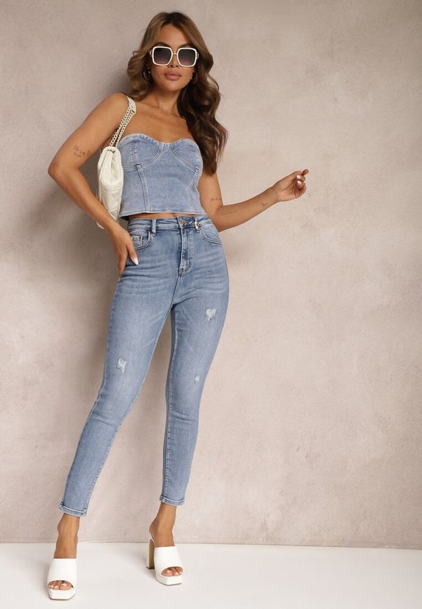Renee - Jasnoniebieskie Casualowe Skinny Jeansy z Bawełny z Przetarciami na Nogawkach Cirea. Okazja: na co dzień. Kolor: niebieski. Styl: casual