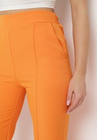 Born2be - Pomarańczowe Garniturowe Spodnie z Szerokimi Nogawkami i Gumką w Pasie Leilma. Stan: podwyższony. Kolor: pomarańczowy. Styl: elegancki