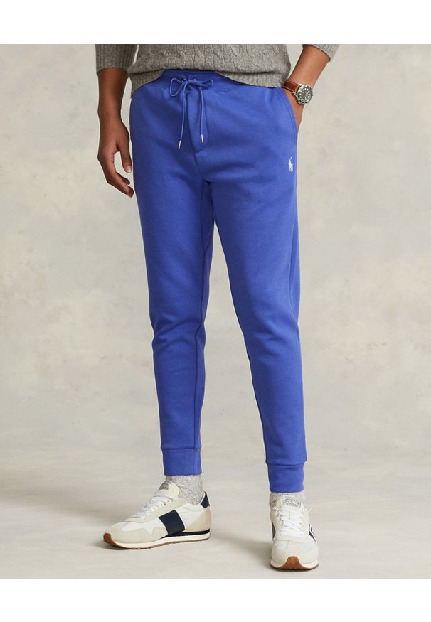 Ralph Lauren - RALPH LAUREN - Błękitne joggery z logo. Kolor: niebieski. Materiał: bawełna, dzianina. Wzór: haft