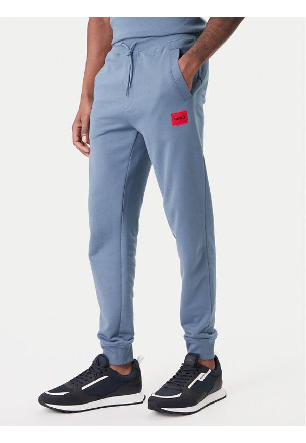 Hugo - HUGO Spodnie dresowe Doak212 50447963 Granatowy Regular Fit. Kolor: niebieski. Materiał: bawełna