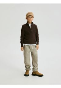 Reserved - Bawełniane spodnie jogger - beżowy. Kolor: beżowy. Materiał: bawełna