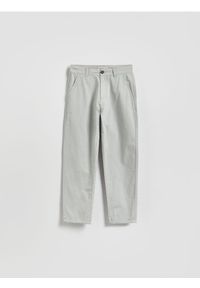 Reserved - Bawełniane spodnie chino - kremowy. Kolor: kremowy. Materiał: bawełna #1