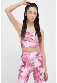 CASALL - Casall top do jogi kolor różowy. Kolor: różowy. Materiał: skóra, dzianina, materiał, włókno. Długość rękawa: na ramiączkach. Wzór: ze splotem