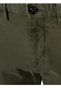TOMMY HILFIGER - Tommy Hilfiger Spodnie "Bleecker Chino" | MW0MW04651321 | Bleecker Slim | Mężczyzna | Wojskowa Zieleń. Materiał: elastan, bawełna. Styl: militarny