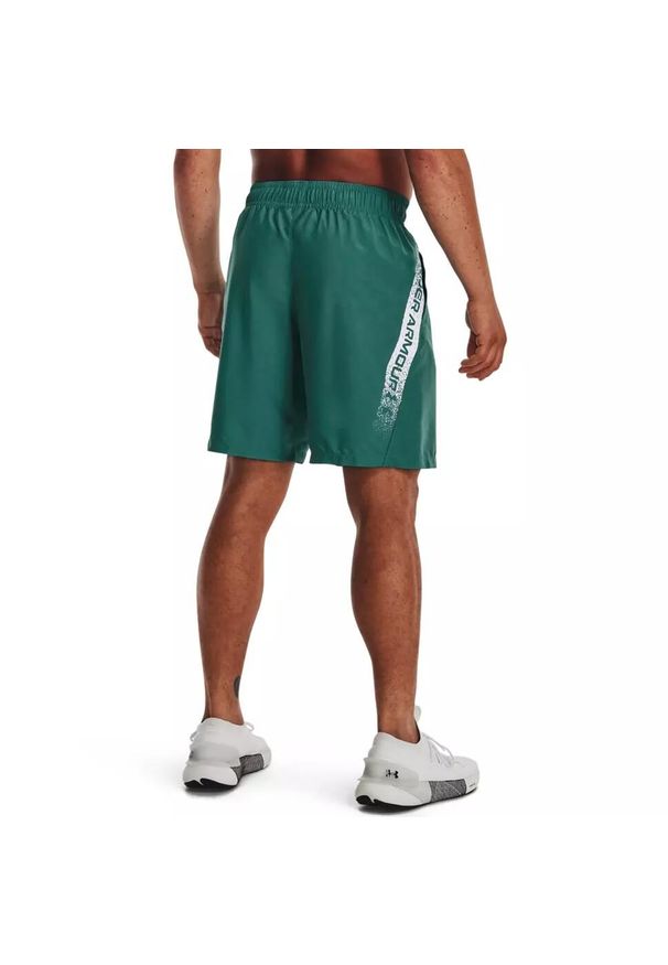 Spodenki do MMA męskie Under Armour Woven Graphic. Kolor: zielony
