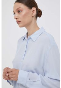 TOMMY HILFIGER - Tommy Hilfiger koszula damska kolor niebieski relaxed z kołnierzykiem klasycznym. Typ kołnierza: kołnierzyk klasyczny. Kolor: niebieski. Materiał: tkanina. Styl: klasyczny