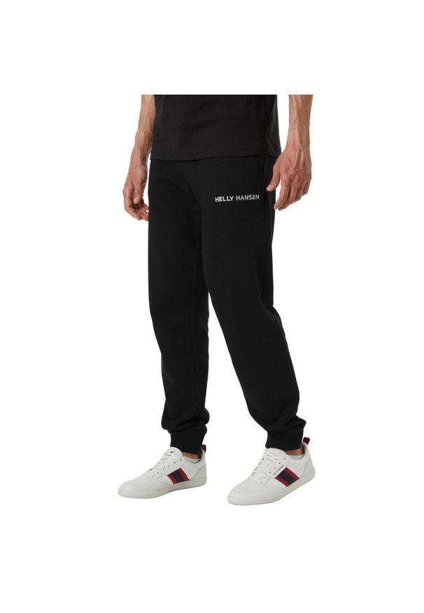 Spodnie sportowe męskie Helly Hansen Core. Kolor: czarny. Materiał: dresówka. Sport: turystyka piesza