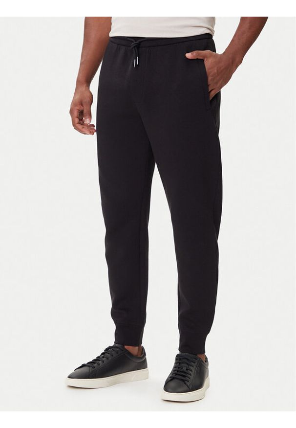 Armani Exchange Spodnie dresowe XM001886 AF10818 MC237 Czarny Slim Fit. Kolor: czarny. Materiał: bawełna