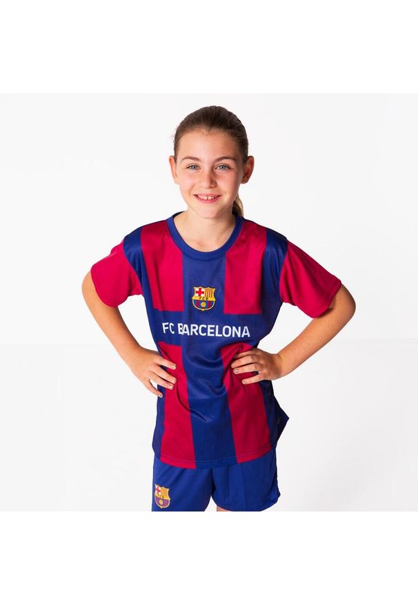 Strój piłkarski dla dzieci FC Barcelona home 23/24. Kolor: wielokolorowy, niebieski, czerwony. Sport: piłka nożna