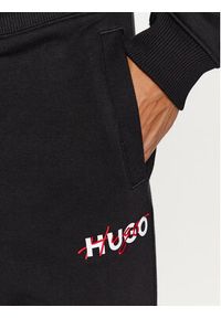 Hugo Spodnie dresowe Drokko 50494571 Czarny Relaxed Fit. Kolor: czarny. Materiał: syntetyk, dresówka, bawełna