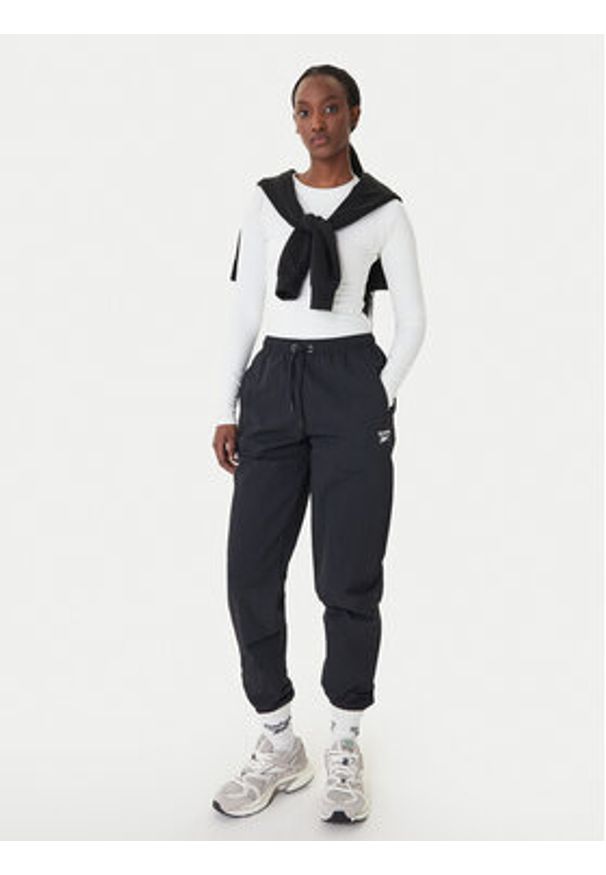 Reebok Spodnie dresowe Galina RK25518CCW Czarny Relaxed Fit. Kolor: czarny. Materiał: syntetyk
