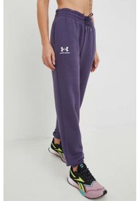 Under Armour spodnie dresowe damskie kolor granatowy gładkie. Stan: podwyższony. Kolor: fioletowy. Materiał: dresówka. Wzór: gładki #2