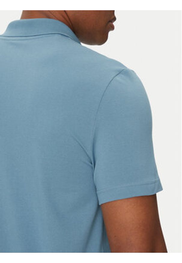 Lacoste Polo DH5522 Niebieski Regular Fit. Typ kołnierza: polo. Kolor: niebieski. Materiał: bawełna, syntetyk