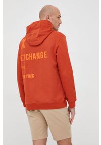 Armani Exchange bluza męska kolor pomarańczowy z kapturem z nadrukiem. Okazja: na co dzień. Typ kołnierza: kaptur. Kolor: pomarańczowy. Materiał: włókno. Wzór: nadruk. Styl: casual