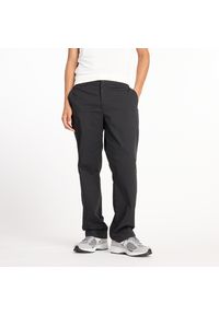Spodnie męskie New Balance MP43560BK – czarne. Kolor: czarny. Materiał: bawełna, materiał, nylon. Wzór: aplikacja