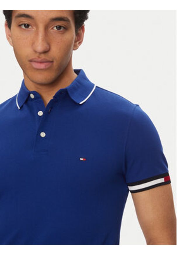 TOMMY HILFIGER - Tommy Hilfiger Polo Flag Cuff MW0MW38458 Niebieski Slim Fit. Typ kołnierza: polo. Kolor: niebieski. Materiał: bawełna