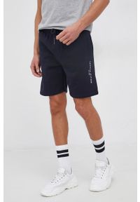 TOMMY HILFIGER - Tommy Hilfiger Szorty męskie kolor granatowy. Okazja: na co dzień. Kolor: niebieski. Materiał: dzianina. Wzór: gładki. Styl: casual