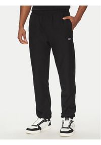 Champion Spodnie dresowe 221620 Czarny Regular Fit. Kolor: czarny. Materiał: bawełna