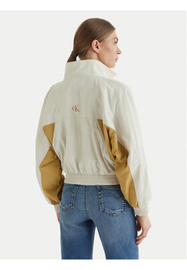 Calvin Klein Jeans Kurtka bomber LV047F506G Beżowy Regular Fit. Kolor: beżowy. Materiał: syntetyk