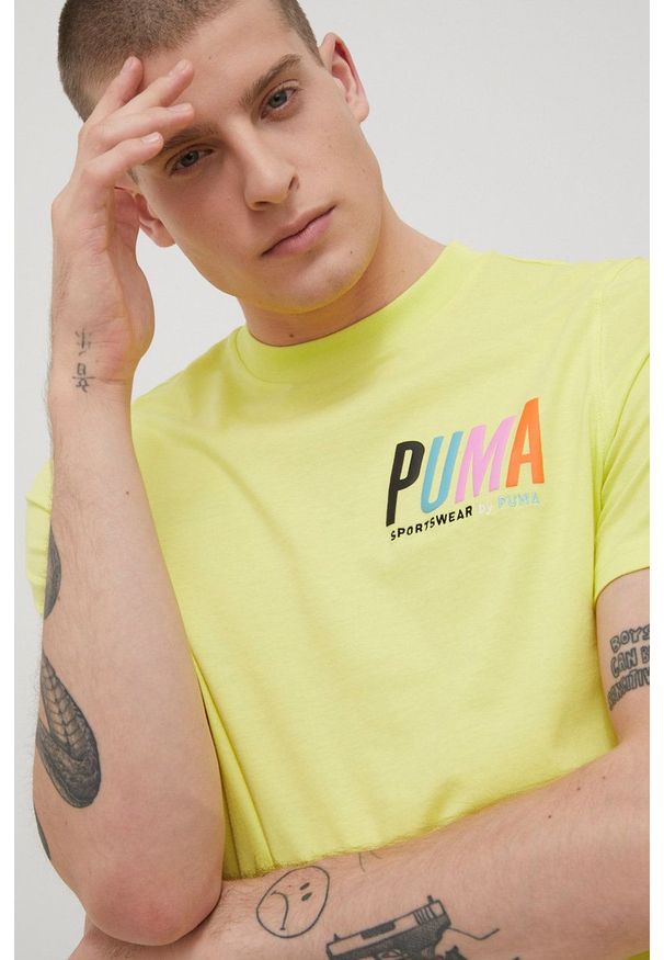 Puma t-shirt bawełniany kolor żółty z aplikacją. Kolor: żółty. Materiał: bawełna. Wzór: aplikacja