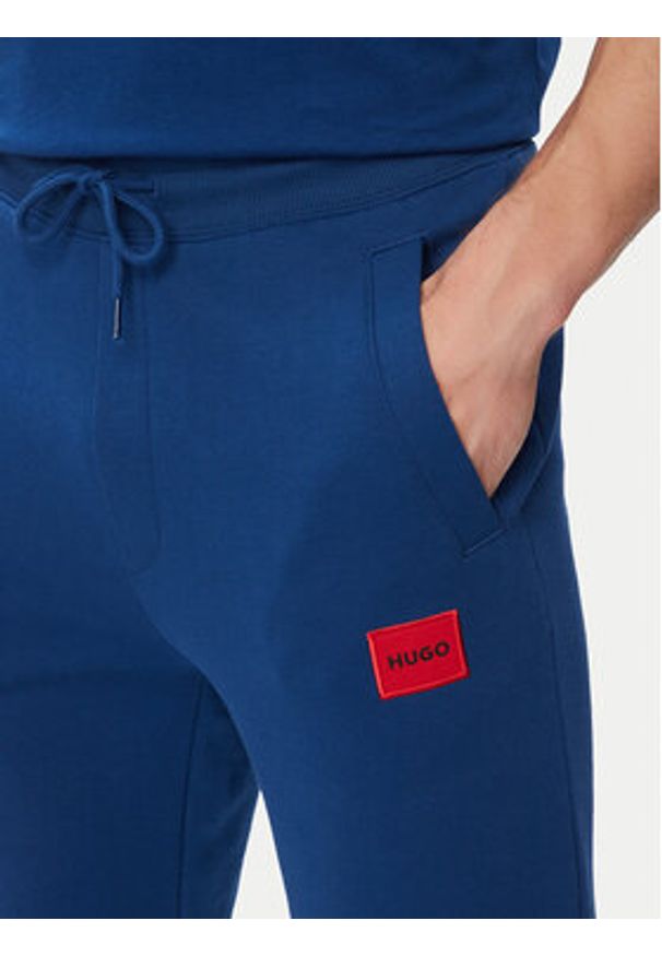 Hugo - HUGO Spodnie dresowe Doak212 50447963 Niebieski jasny Regular Fit. Kolor: niebieski. Materiał: bawełna