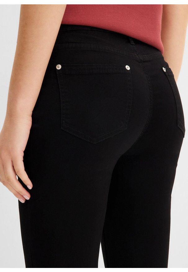 bonprix - Dżinsy skinny ze średnim stanem, z super stretchem. Kolor: czarny