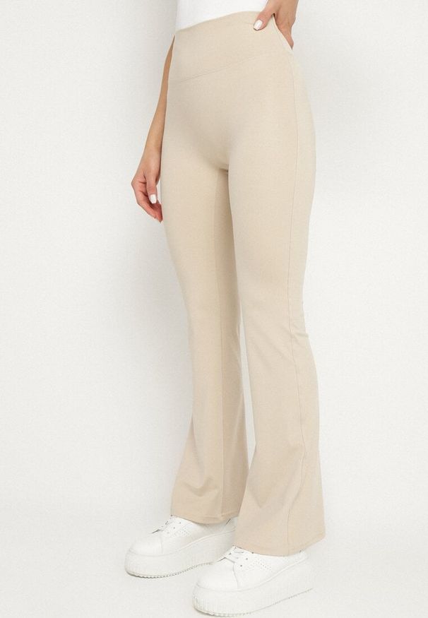 Born2be - Beżowe Legginsy Typu Dzwony z Wysokim Stanem Orralise. Okazja: na co dzień. Stan: podwyższony. Kolor: beżowy. Styl: casual