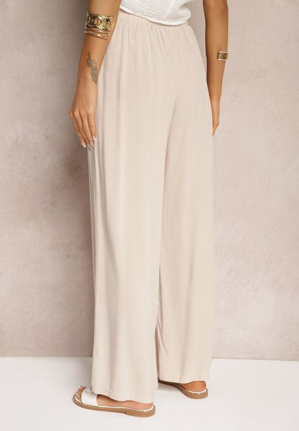 Renee - Jasnobeżowe Spodnie z Bawełny Typu Palazzo High Waist z Gumką w Talii Nelsaria. Okazja: na co dzień. Stan: podwyższony. Kolor: beżowy. Materiał: bawełna. Styl: wizytowy, elegancki, casual