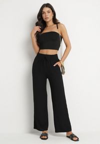 Born2be - Czarne Spodnie o Szerokim Kroju z Wysokim Stanem i Gumką w Talii Saviellea. Okazja: na co dzień. Stan: podwyższony. Kolor: czarny. Styl: klasyczny, casual, elegancki #6