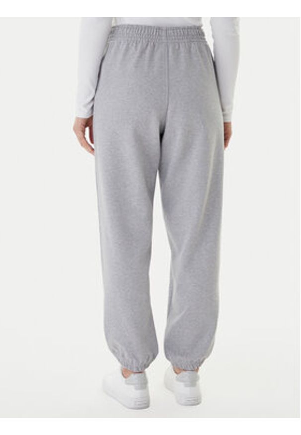 Calvin Klein Jeans Spodnie dresowe Foil Monologo LV047E826G Szary Regular Fit. Kolor: szary. Materiał: bawełna