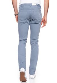 Wrangler - WRANGLER SPODNIE MĘSKIE LARSTON FLINTSTONE BLUE W18SHD13F. Materiał: materiał #4