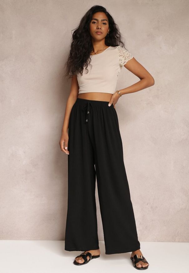 Renee - Czarne Spodnie z Gumką w Pasie i Szerokimi Nogawkami Seira. Kolor: czarny