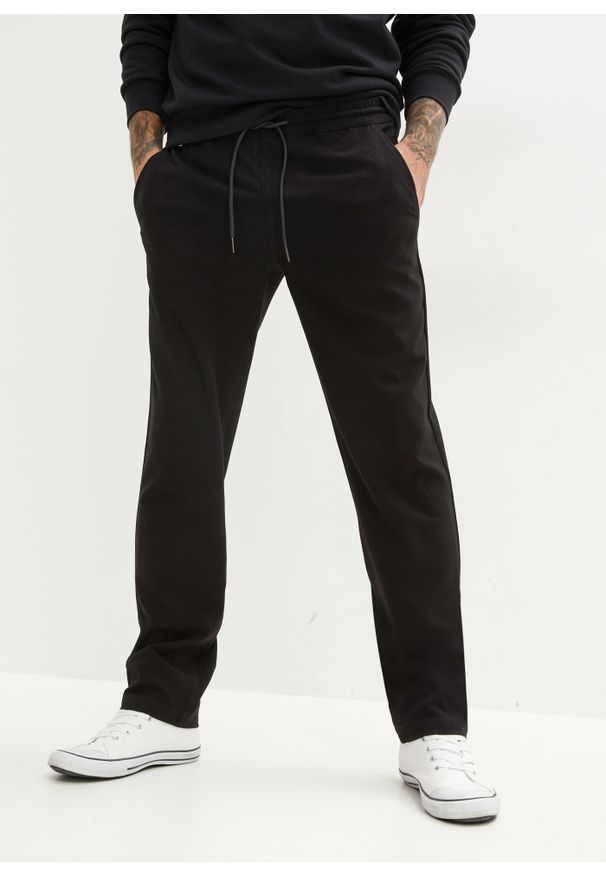 bonprix - Spodnie chino ze stretchem i gumką w talii, Loose Fit Straight. Kolor: czarny