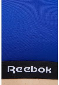 Reebok Biustonosz sportowy U4.F9687 gładki. Kolor: niebieski. Materiał: materiał. Rodzaj stanika: wyciągane miseczki, odpinane ramiączka. Wzór: gładki #4