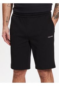 Calvin Klein Szorty sportowe Micro Logo K10K111208 Czarny Regular Fit. Kolor: czarny. Materiał: bawełna, syntetyk. Styl: sportowy