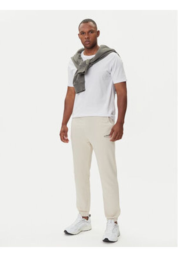 Jack & Jones Spodnie dresowe Kane Soho 12278943 Beżowy Regular Fit. Kolor: beżowy. Materiał: bawełna