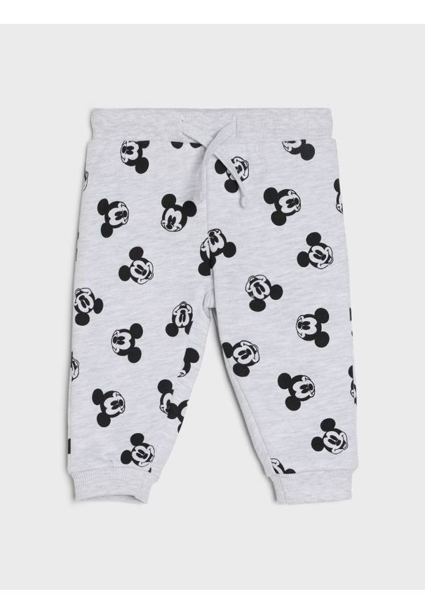 Sinsay - Spodnie dresowe jogger ze wzorem Mickey Mouse - szary. Kolor: szary. Materiał: dresówka. Wzór: motyw z bajki