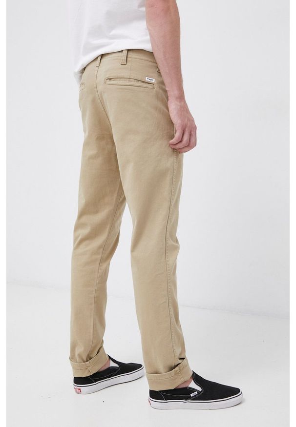 Wrangler - Spodnie. Kolor: beżowy. Materiał: tkanina. Wzór: gładki