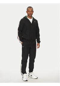 Lacoste Spodnie dresowe XH8974 Czarny Relaxed Fit. Kolor: czarny. Materiał: syntetyk #5