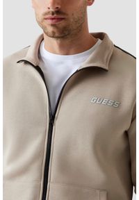 Guess - GUESS Beżowa bluza męska z lampasami Mickey. Kolor: zielony #5